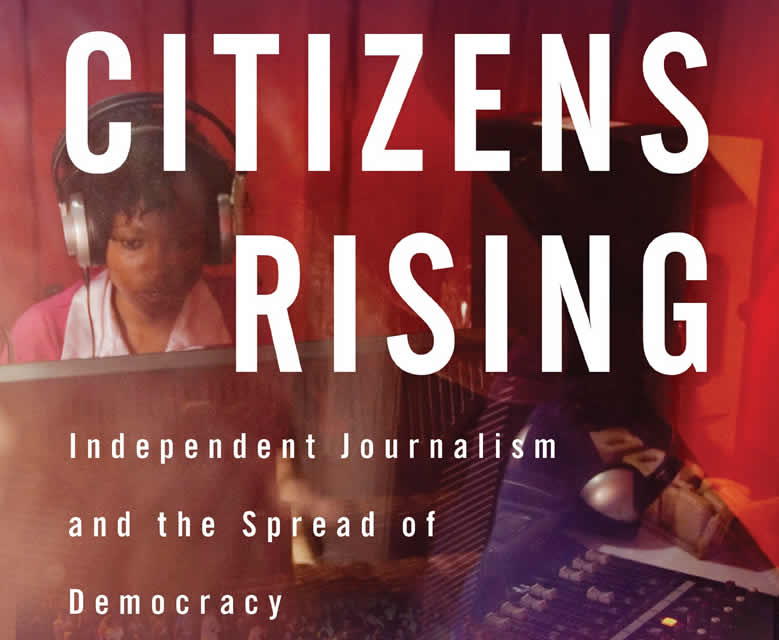 A person wearing headphones is seated at a desk with audio equipment. The text "Citizens Rising" is prominently displayed in large white letters, with the subtitle "Independent Journalism and the Spread of Democracy" below. The background features a rich red hue, emphasizing the theme of empowerment through media.