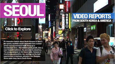 A bustling street scene in Seoul at night features various illuminated signs in Korean. A diverse crowd of people walks along the street. Text overlays mention "Seoul," "Click to Explore," and "Video Reports From South Korea & America," along with a brief description.