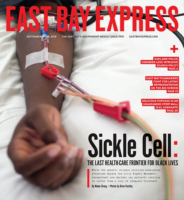 Cover of East Bay Express magazine dated September 5-11, 2018. It features a close-up of an arm with an intravenous line and medical tubes attached, alongside the headline: 