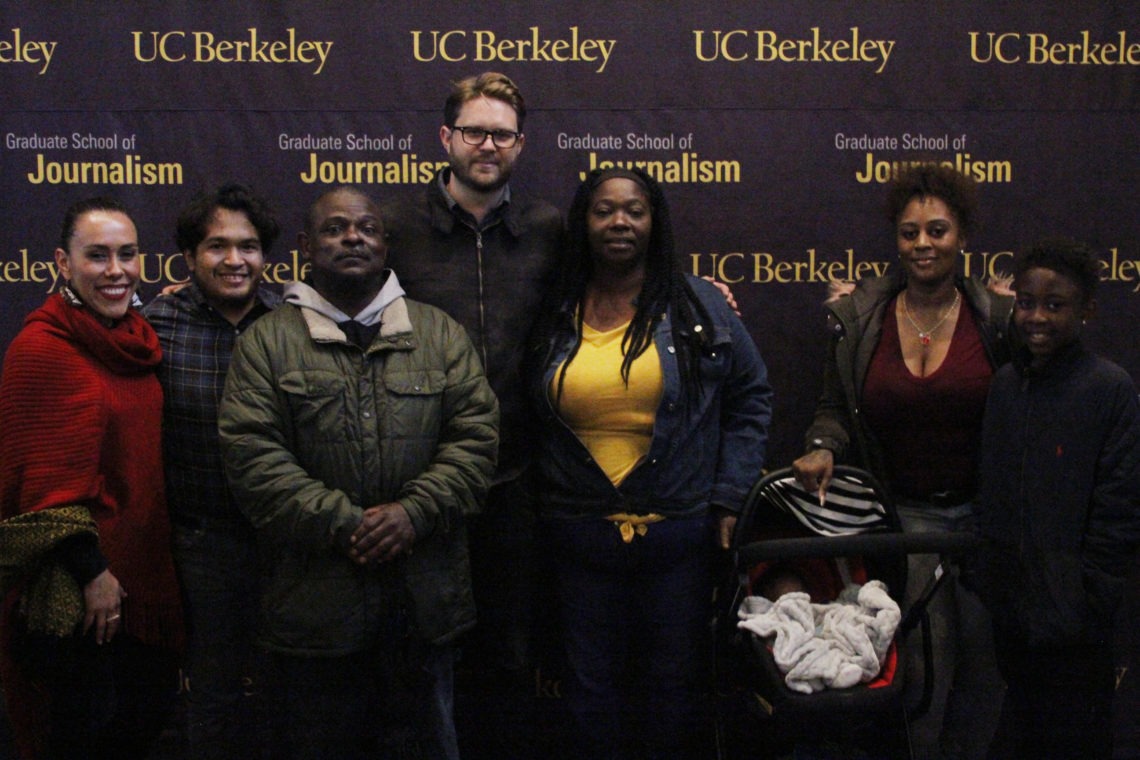 A group standing together for a photo at a UC Berkeley Journalism event.