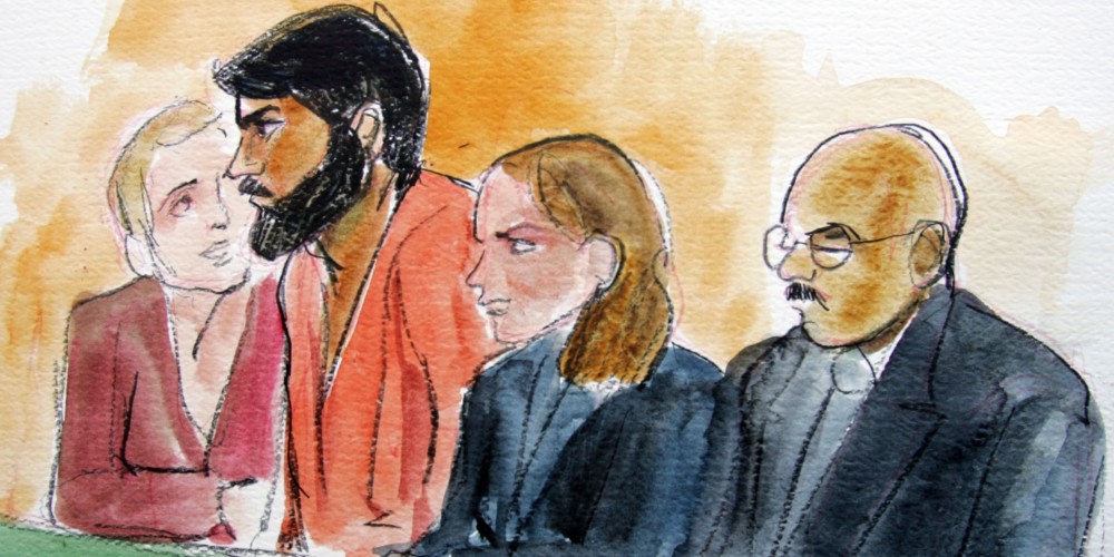 A courtroom sketch shows four people seated in a row. The individuals include a man in an orange outfit, a woman from Berkeley Journalism scribbling on a notepad, another man conversing with the man in orange, and an older man with glasses and a mustache.