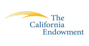 Logo of The California Endowment, featuring a stylized, curved golden-yellow swoosh on the left and the organization's name in blue text on the right. The swoosh design starts thick on the left and tapers off toward the right, symbolizing their commitment to mental health and trauma recovery.