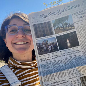 photo of intern holding New York Times