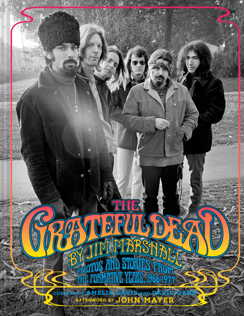 A book cover with The Grateful Dead logo in color and a black and white image of the band. 
