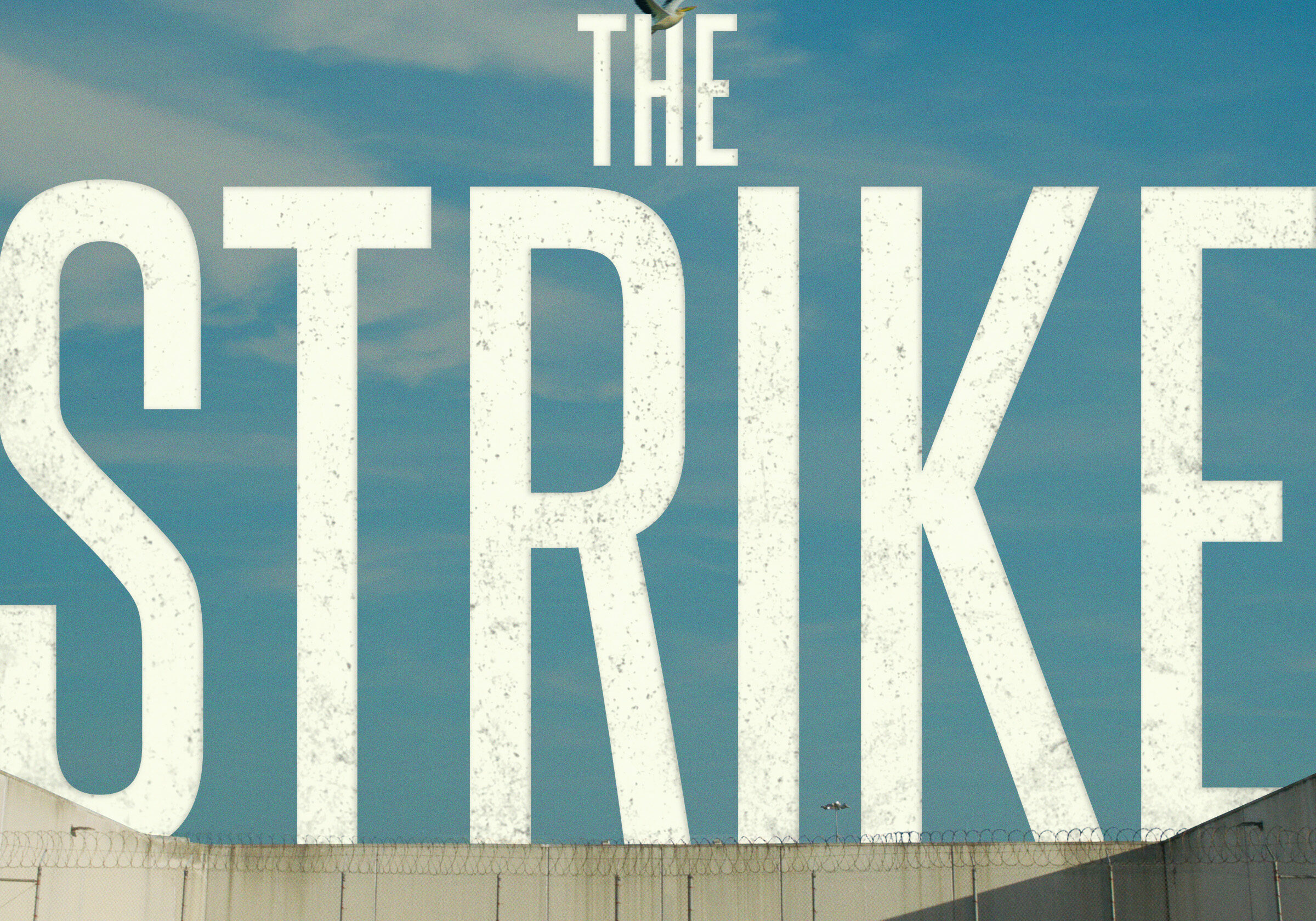 Poster for the documentary "The Strike" with a sky background and tall white letters.